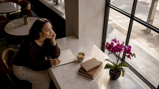 Woman journaling to build personal identity