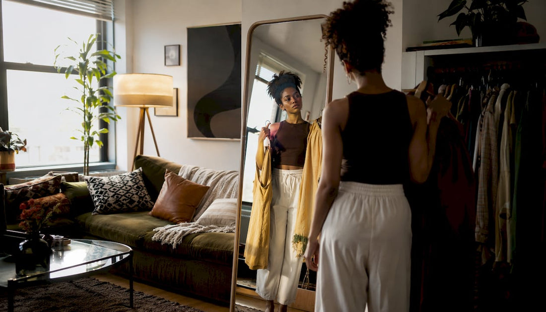 Woman choosing clothes for self-expression