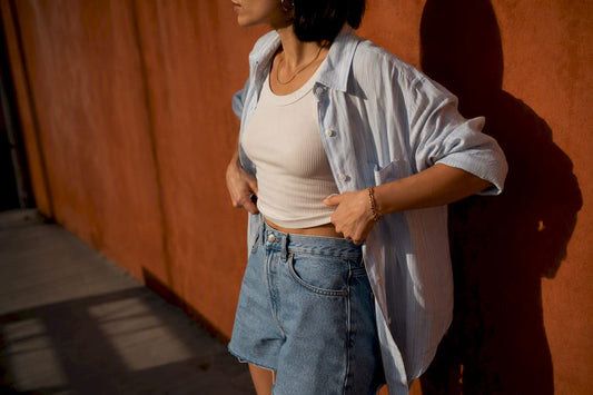Model styling ribbed tank top under blazer