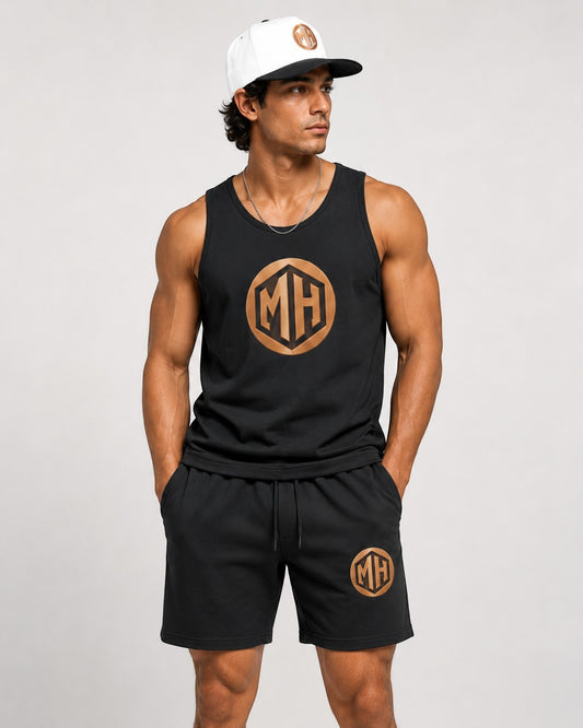 MR. HAPPINESS black oversized muscle tank with gold MH logo on chest, made of 100% cotton.